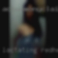 Lactating redheaded woman